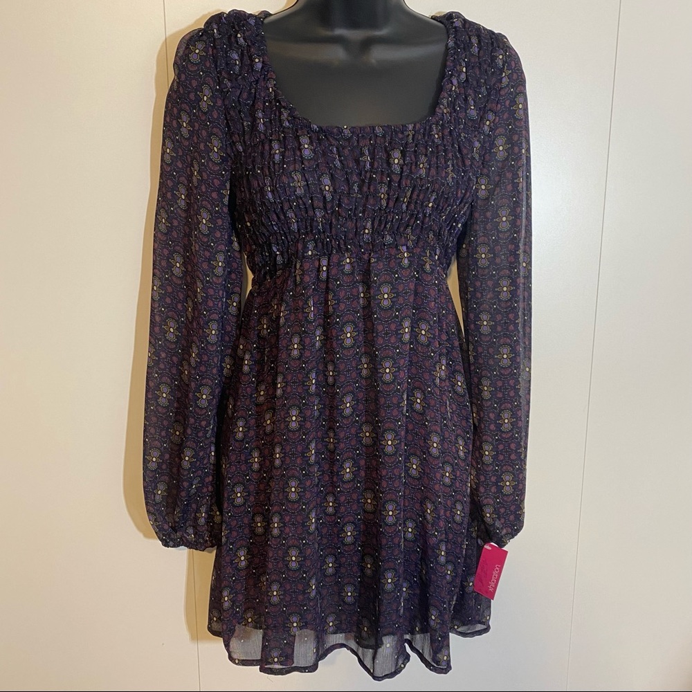 Womens purple xhiliration pullover shirt. Long sleeve